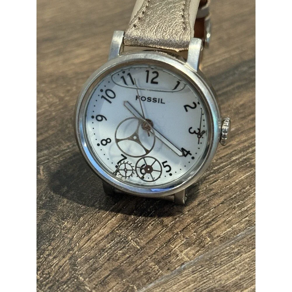 Fossil Women's Watch White Dial Silver Tone Case Metallic Genuine Leather  Strap